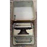 PORTABLE CASED OLYMPIA TYPEWRITER