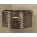 A SILVER NAPKIN RING WITH PLAIN CARTOUCHE, B'HAM 1931