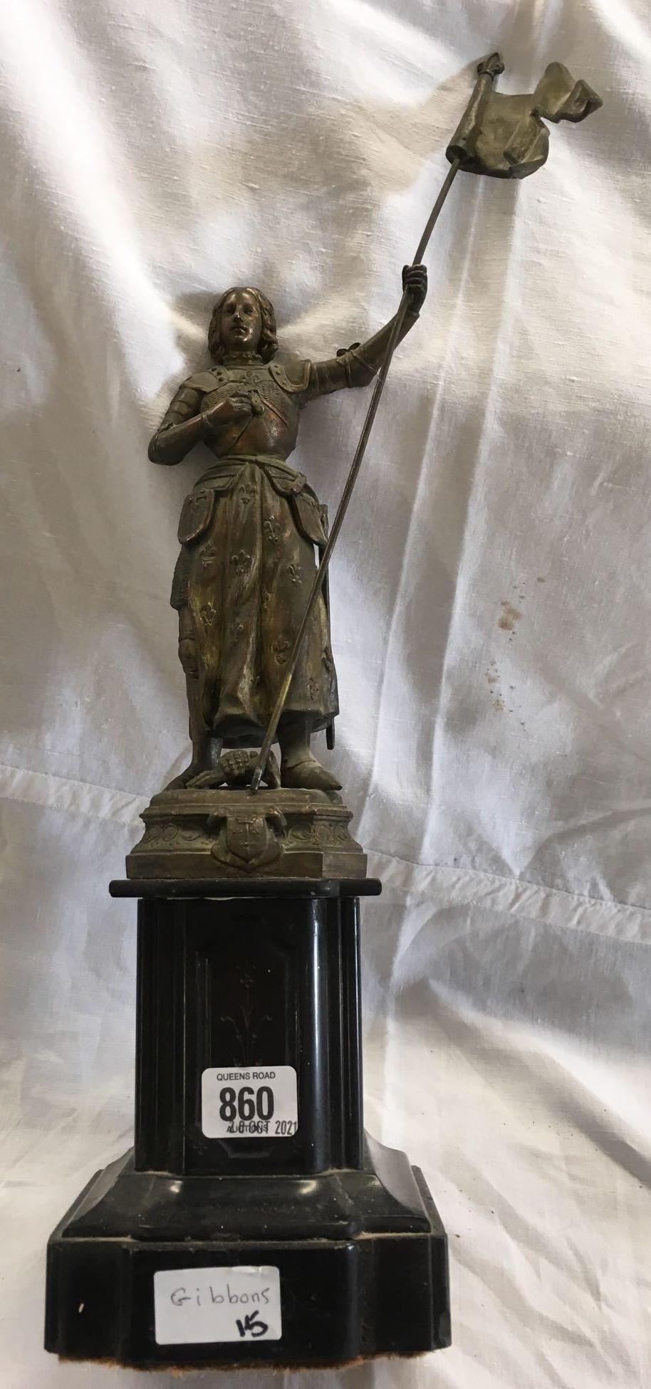 FIGURE OF JOAN OF ARC STANDING ON A MARBLE BASE