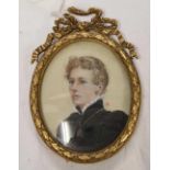 A PORTRAIT MINIATURE OF A LADY IN A BLACK DRESS WITH HIGH LACED COLLAR, SIGNED WITH INITIALS,