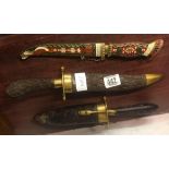 3 ORNAMENTAL KNIVES WITH SHEATHS