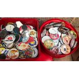 2 CHOCOLATE TUBS OF PIN BADGES