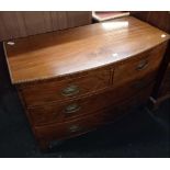 FLAME VENEERED MAHOGANY BOW FRONT CHEST OF 4 DRAWERS