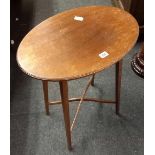 OVAL MAHOGANY TABLE WITH CROSSED STRETCHERS & BEADED TOP, 1ft9'' WIDE