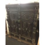 LARGE HEAVILY CARVED DARK OAK CUPBOARD