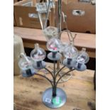 MODERN 5 BRANCH OIL LAMP & A METAL TEA LAMP STAND WITH 7 GLASS HOLDERS