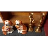 PAIR OF STAFFORDSHIRE FLAT BACK SPANIELS & A PAIR OF TALL BRASS CANDLESTICKS