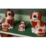 PAIR OF STAFFORDSHIRE FLAT BACK SPANIELS & A SMALLER 1