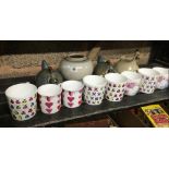 SHELF OF COFFEE CUPS & STUDIO POTTERY