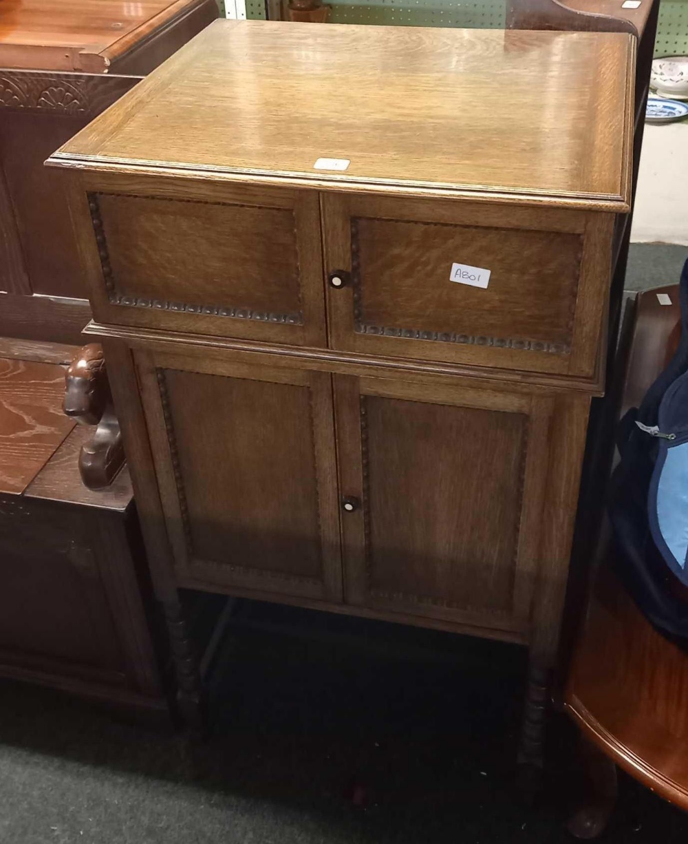 OAK CARVED CABINET WITH HINGED TOP, ORIGINALLY CONTAINED MARCONI RADIOGRAM