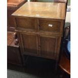 OAK CARVED CABINET WITH HINGED TOP, ORIGINALLY CONTAINED MARCONI RADIOGRAM