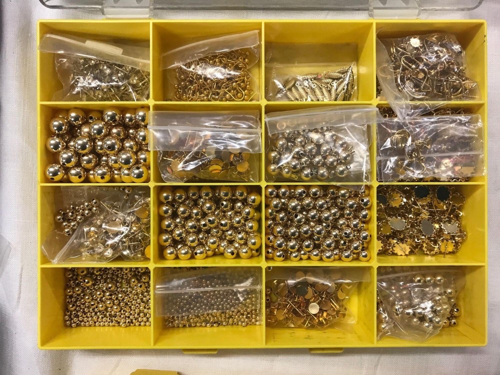 TRAY OF VARIOUS SIZED ROLLED GOLD BEADS, EARRING CLASPS ETC, 480g APPROX