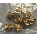 SMALL BAG OF 14ct GOLD SPACERS, 3.5g