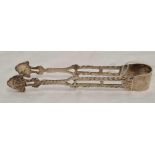 A PAIR OF VICTORIAN CAST SUGAR TONGS, CHESTER 1901