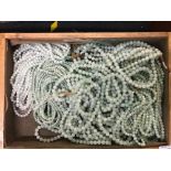 LARGE TRAY OF AVENTURINE BEAD NECKLACES