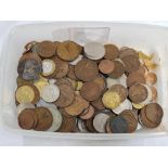 A TUB OF MOSTLY FOREIGN COINS