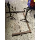ANTIQUE VINTAGE STYLE WOODEN BOW SAW & A PAIR OF WROUGHT IRON ANDIRONS