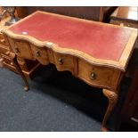 WALNUT & MAHOGANY SERPENTINE FRONTED LADIES DESK WITH LEATHER TOP & BRASS DROP HANDLES