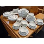 PATTERNED CHINA DINNER SERVICE WITH 18 DINNER PLATES, 8 SOUP BOWLS, 2 TUREENS,MEAT PLATE ETC BY