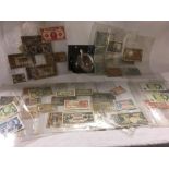 QTY OF PAPER BANK NOTES IN FOLDERS