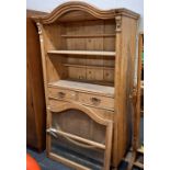 NARROW STRIPPED PINE DRESSER WITH ARCHED TOP, GLASSED DOOR, (UNATTACHED)