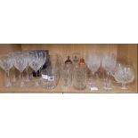 SHELF OF CUT GLASS WINE GLASSES, BEER GLASSES ETC