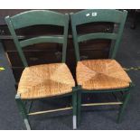 PAIR OF GREEN PAINTED STRING SEATED KITCHEN CHAIRS