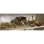 SHELF OF BRASS ORNAMENTS, ASHTRAYS, PLANT HOLDER ETC