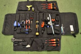 Tool kit in roll up pouch