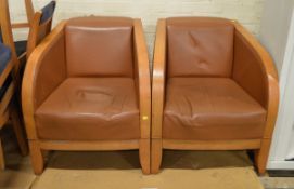 2x Brown Leather Chairs with Wooden Surround