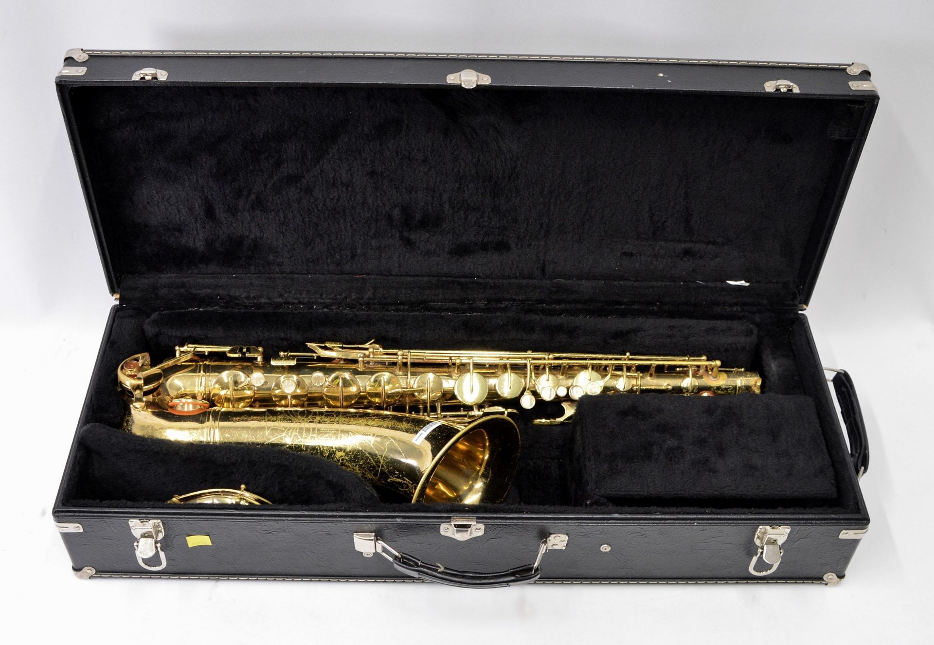 Conn Saxophone with Case. Obvious dents. Serial No. N153795.