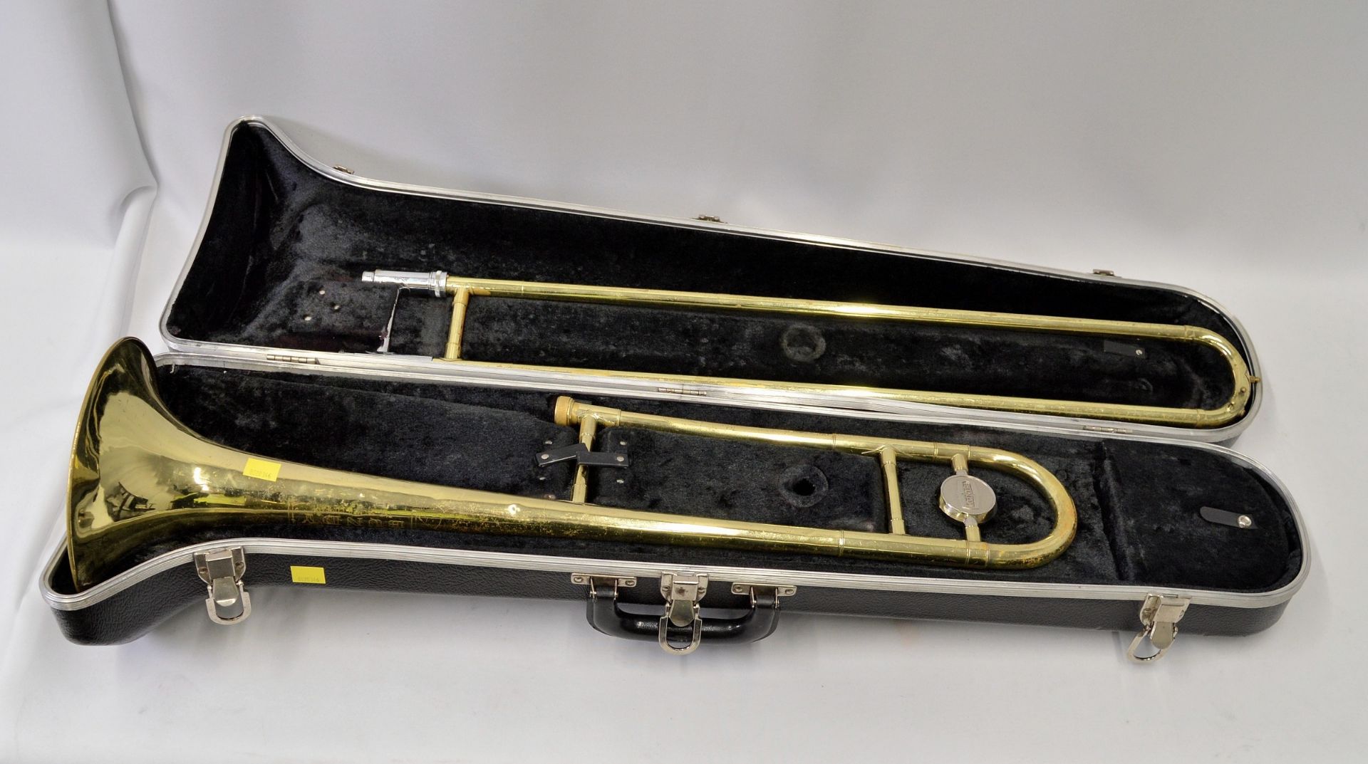 Selmer Bundy Trombone with Case. Obvious dents.