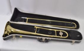 Selmer Bundy Trombone with Case. Obvious dents.