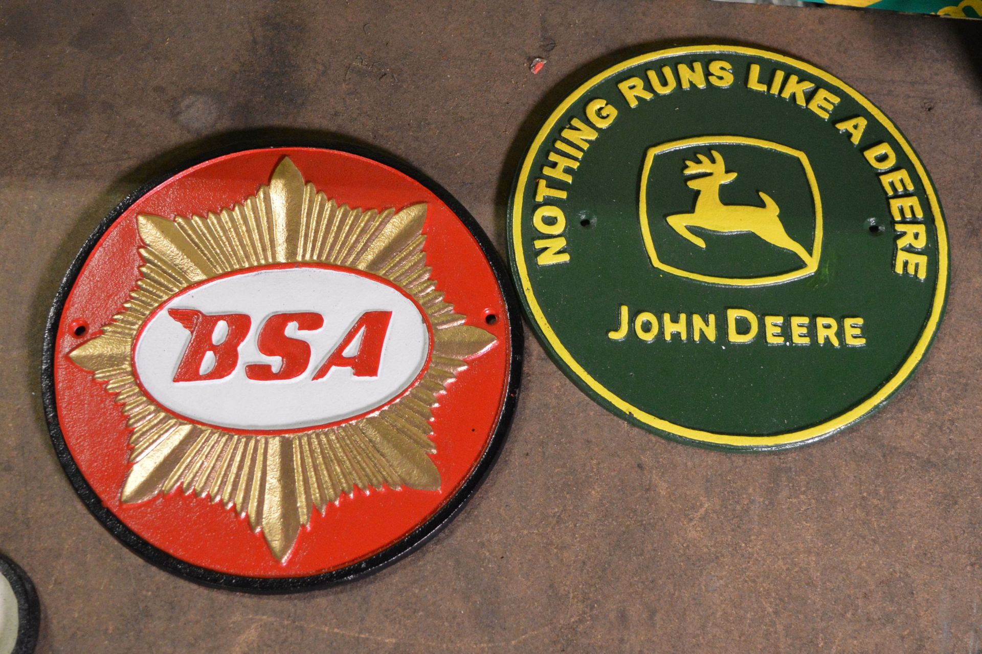 2x Cast signs - 24cm diameter - John Deere, BSA