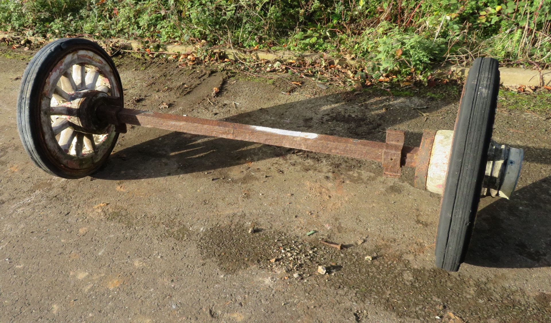 Pair Of Wooden Wheels But Shod With Rubber Tyres - Mounted On Steel Axle