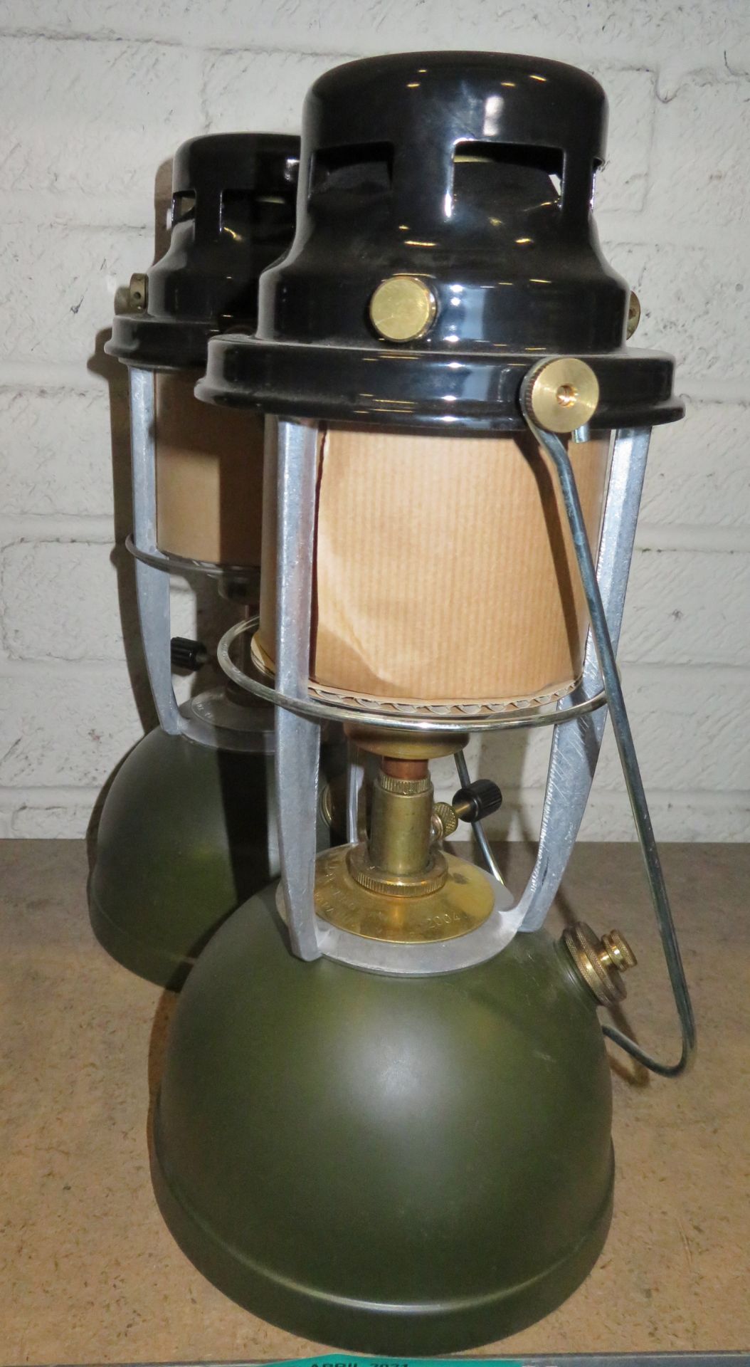 2x Kerosene Lanterns - green base, black top