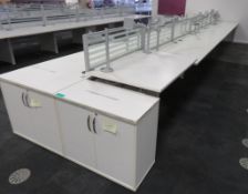 12 Person Desk Arrangement With Dividers, Monitor Arms & Storage Cupboards.