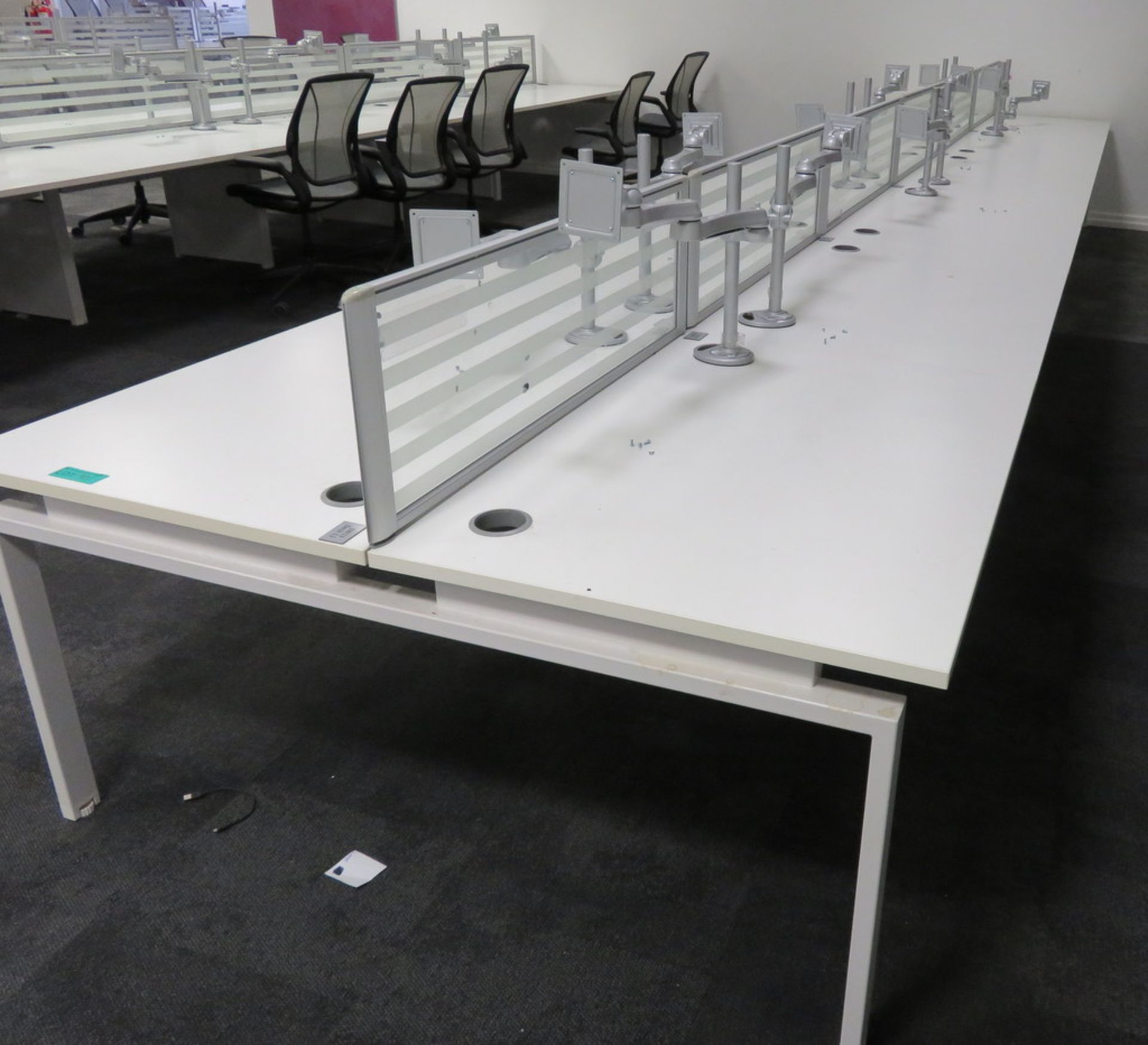 12 Person Desk Arrangement With Dividers & Monitor Arms.