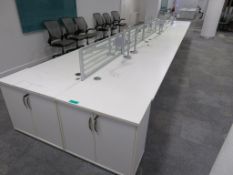 12 Person Desk Arrangement With Dividers, Monitor Arms & Storage Cupboards.