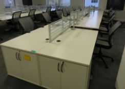 12 Person Desk Arrangement With Dividers, Monitor Arms & Storage Cupboards. Chairs Are Not Included.