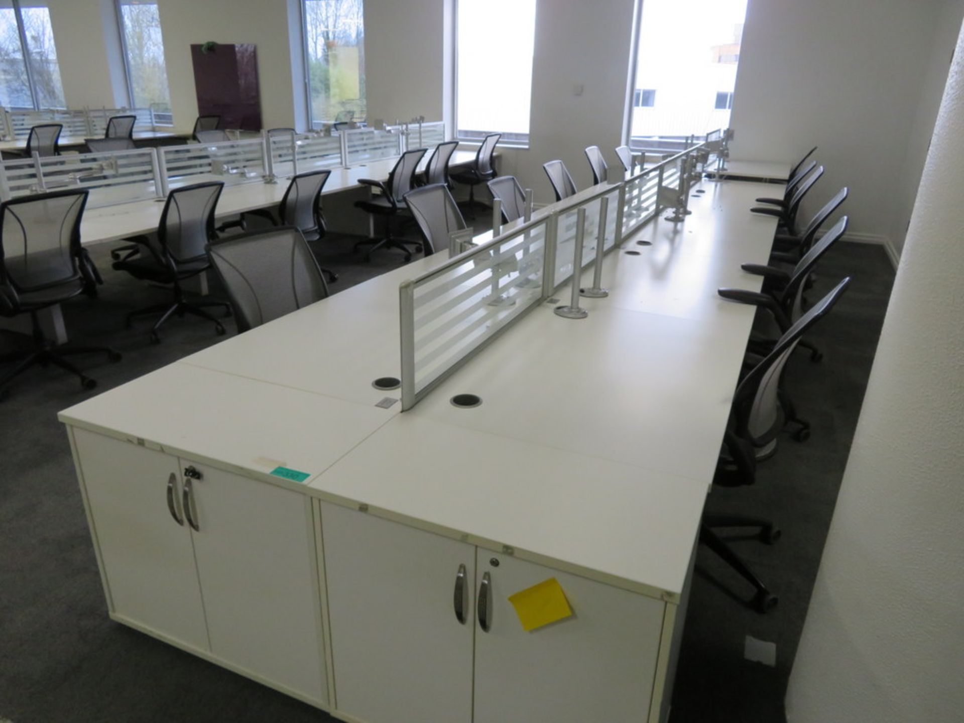 12 Person Desk Arrangement With Dividers, Monitor Arms & Storage Cupboards. Chairs Are Not Included.