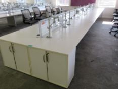 12 Person Desk Arrangement With Dividers, Monitor Arms & Storage Cupboards.