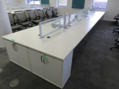 12 Person Desk Arrangement With Dividers, Monitor Arms & Storage Cupboards.