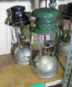 2x Kerosine tilley lamps - silver base, 1x black top, 1x green top