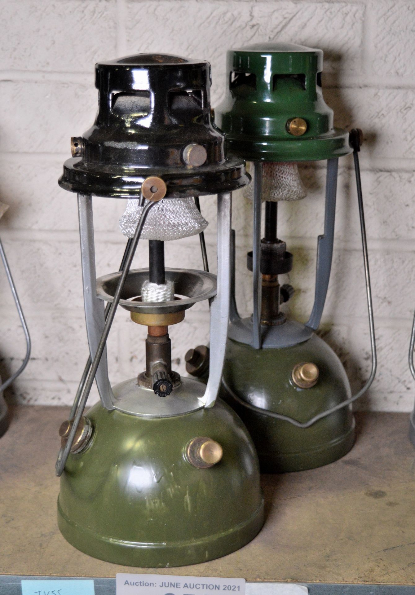 2x Kerosine tilley lamps - 1x green base, black top - 1x green base, green top