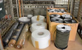 9x rolls of bungee cord, plastic sheeting rolls, wax paper rolls, 2x Velcro soft side reel