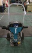 Makita HM1810 Portable Electric Hammer Drill with trolley