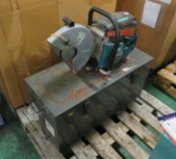 Makita DPC6410 Petrol Circular Saw with metal case