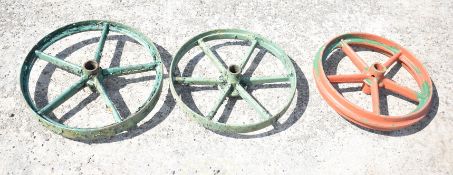 TWO CAST WHEELS (45CM DIAMETER) AND ONE ROLL CRIMP (48CM DIAMETER)