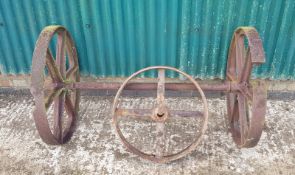 SET OF CAST IRON WHEELS & AXLE